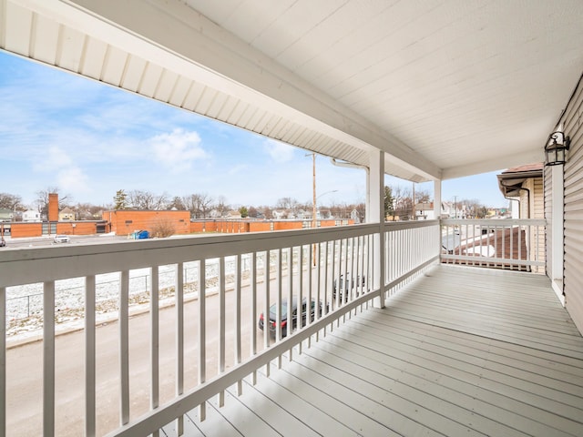 wooden terrace with a porch