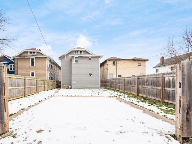 snowy yard with an outdoor structure