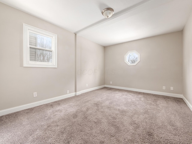 view of carpeted spare room