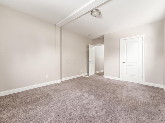 spare room with carpet