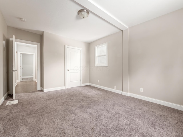 unfurnished bedroom with carpet