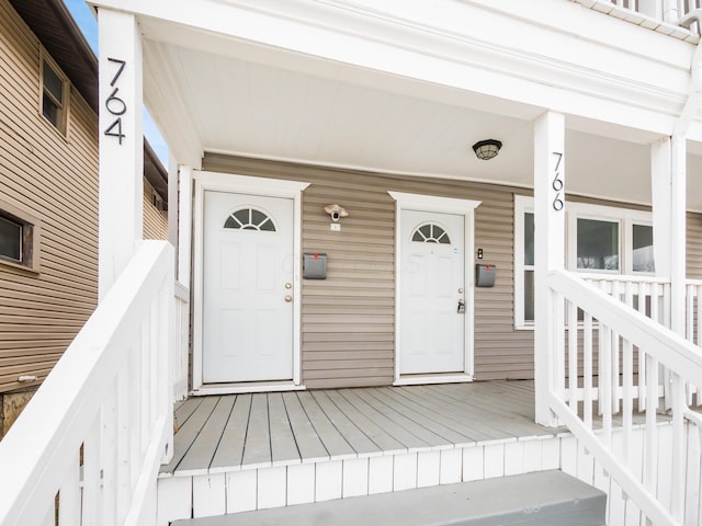 entrance to property with covered porch