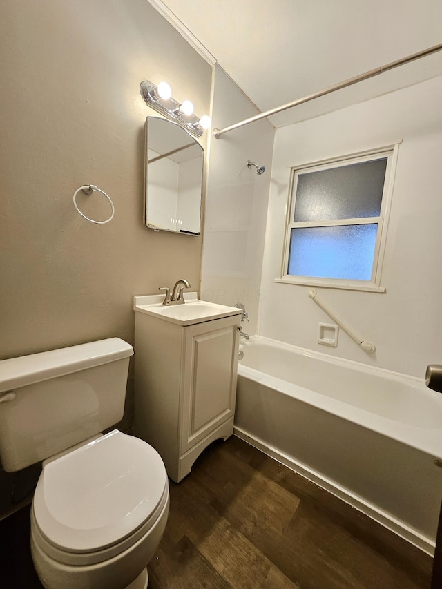 full bathroom with vanity, toilet, shower / bath combination, and hardwood / wood-style floors