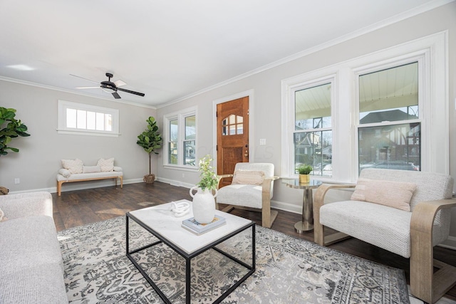 living room with crown molding, hardwood / wood-style floors, and ceiling fan