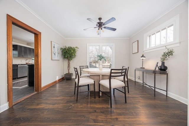 dining area with dark wood-type flooring, a wealth of natural light, ornamental molding, and ceiling fan