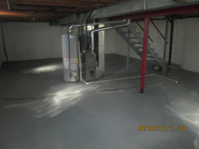 basement featuring water heater