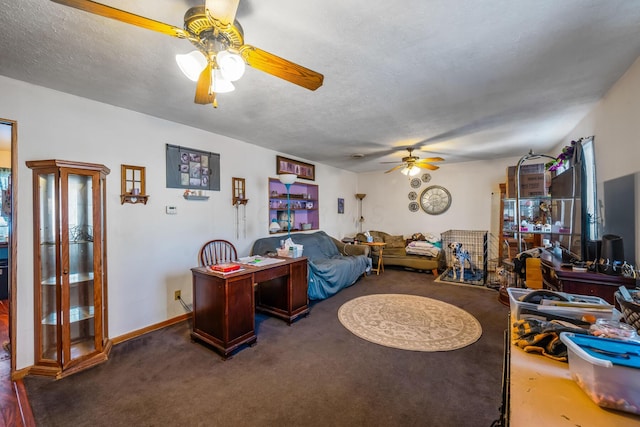 living room with ceiling fan, dark carpet, and a textured ceiling