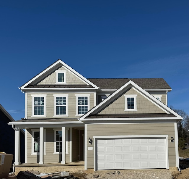 craftsman house featuring a garage and a porch