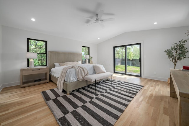 bedroom featuring lofted ceiling, baseboards, access to outside, and light wood-style flooring