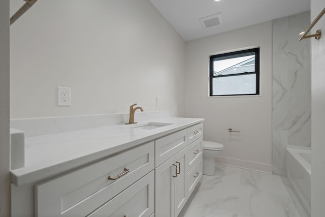 bathroom featuring toilet, visible vents, baseboards, marble finish floor, and vanity