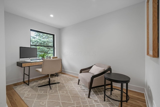 home office with recessed lighting, baseboards, and wood finished floors