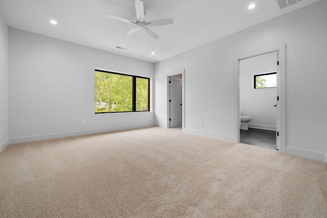 unfurnished bedroom featuring carpet flooring, baseboards, visible vents, and recessed lighting