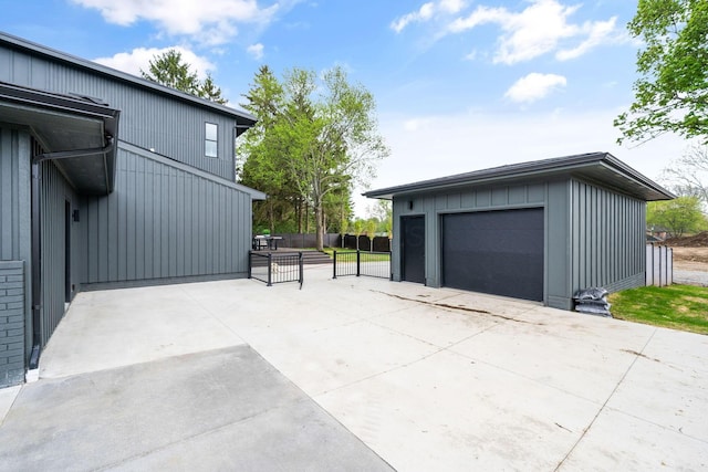 detached garage with fence