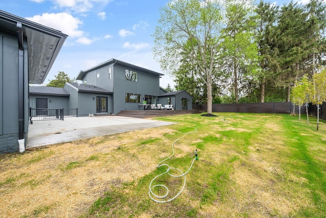 view of yard featuring a patio area and fence