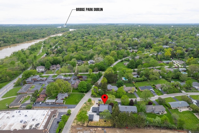 bird's eye view featuring a residential view and a view of trees