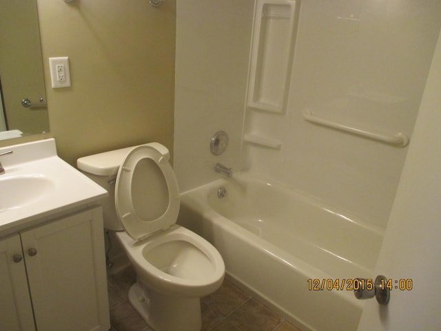 full bathroom featuring tile patterned flooring, vanity, shower / bathing tub combination, and toilet