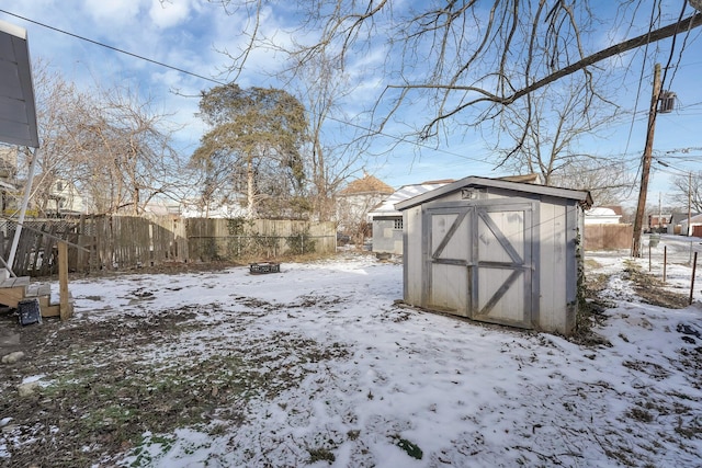 view of yard layered in snow