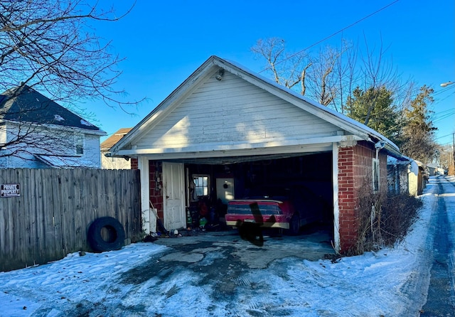 view of snow covered garage