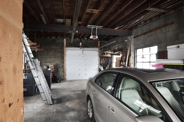 garage featuring a garage door opener