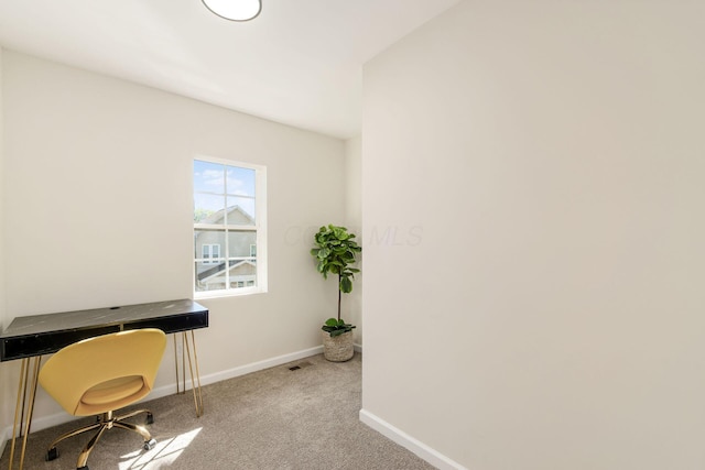 unfurnished office featuring carpet floors