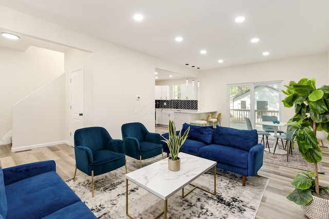 living room with light hardwood / wood-style floors