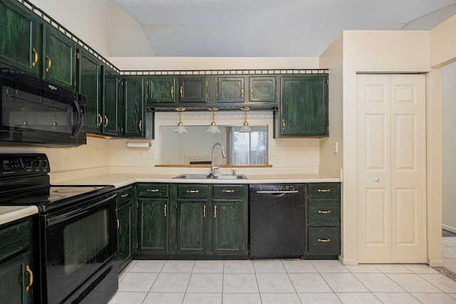 kitchen with sink, black appliances, green cabinetry, and light tile patterned flooring