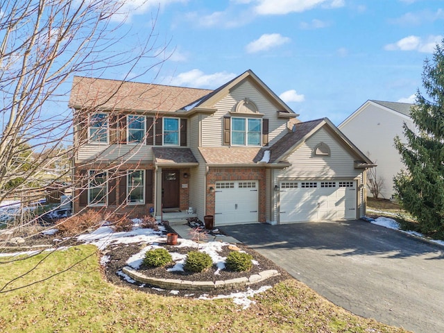 view of front of home with a garage