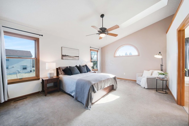 carpeted bedroom with lofted ceiling and ceiling fan