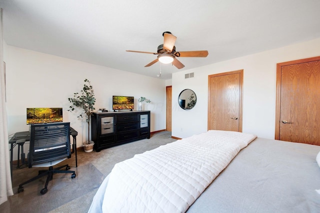 bedroom with light carpet and ceiling fan