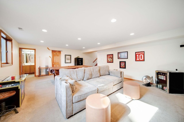 living room featuring light carpet