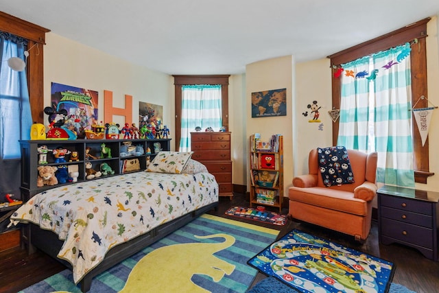 bedroom featuring dark hardwood / wood-style floors