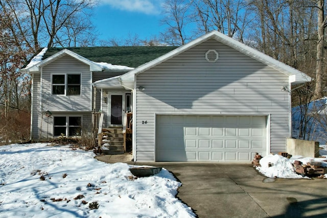 split foyer home featuring a garage