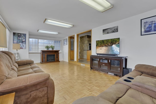 living room featuring light parquet flooring