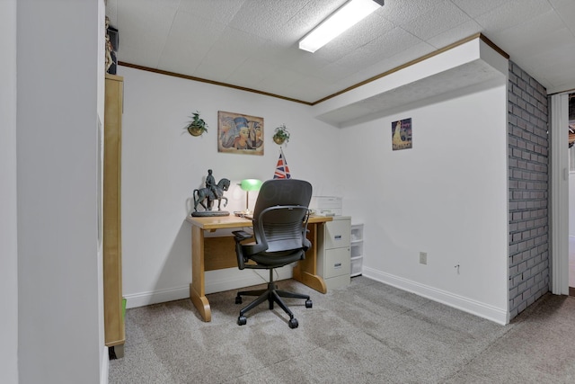 carpeted office featuring crown molding