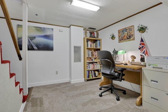 carpeted office space featuring ornamental molding