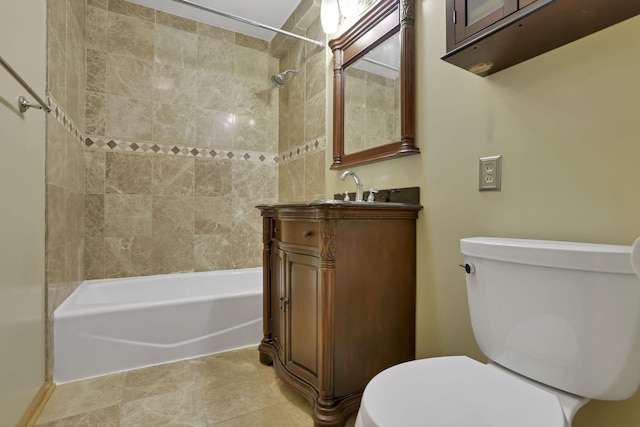 full bathroom with vanity, toilet, and tiled shower / bath