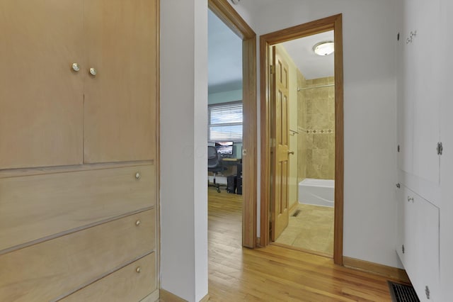 hall featuring light hardwood / wood-style flooring