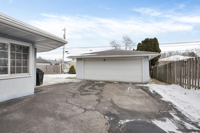 view of snow covered garage