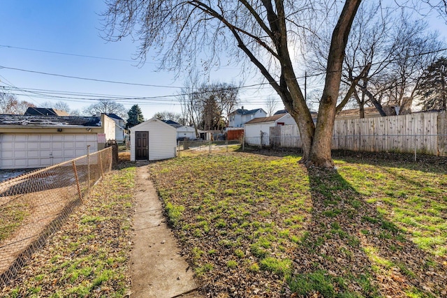 view of yard with a storage unit