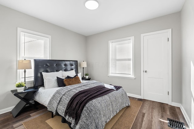 bedroom featuring dark hardwood / wood-style floors