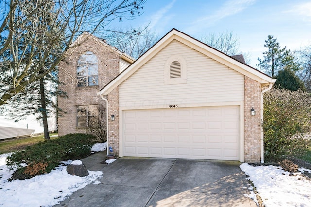 view of front of home with a garage