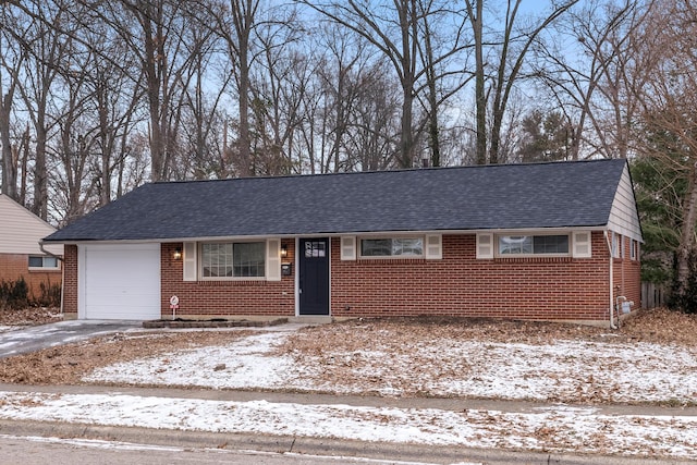 single story home with a garage