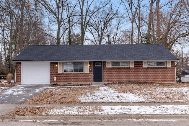 single story home featuring a garage