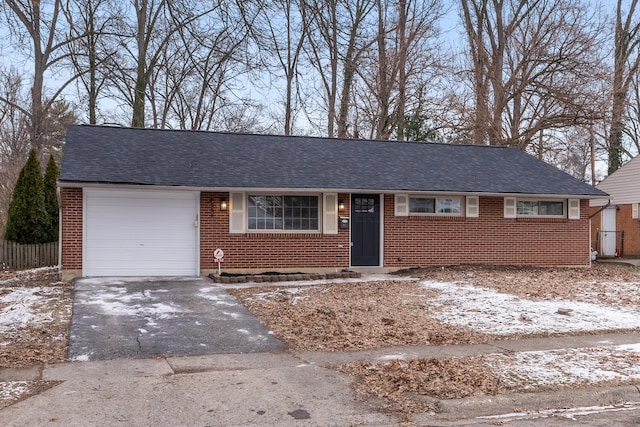 single story home featuring a garage