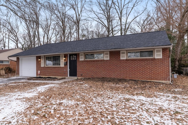 single story home featuring a garage