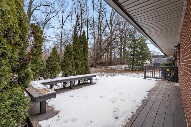 view of snow covered deck