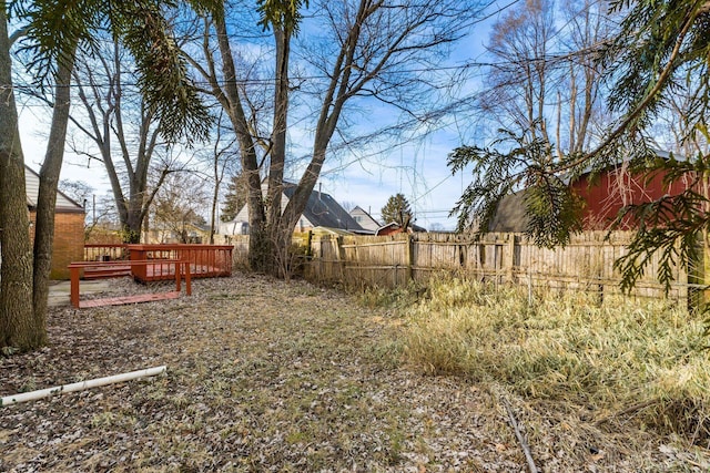 view of yard featuring a deck