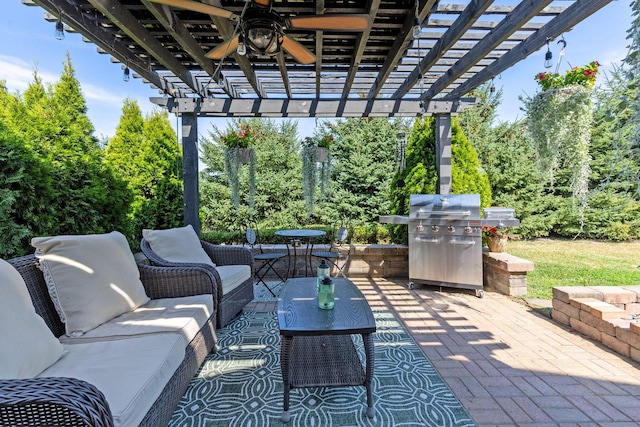 view of patio with outdoor lounge area, a grill, and a pergola