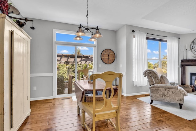 dining space featuring light hardwood / wood-style flooring