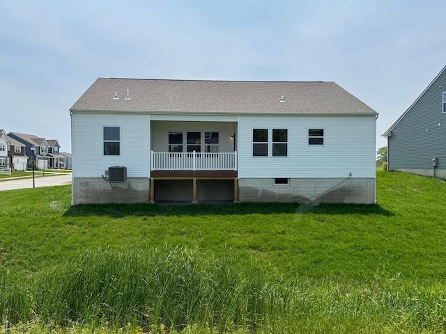 450 Creekside Dr, Commercial Point, OH 43116 - rear view of property with a lawn and central air condition unit